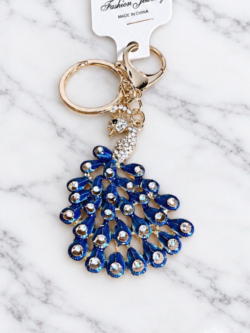 Stunning blue peacock bag charm/keyring with crystal accents gold hardware